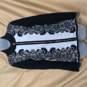 💙new item💙Very cute. Black and white with rhinestone zipper Venus sweater